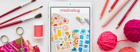 photo of craft materials and ipad showing Creative Bug website