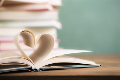 Love Reading! Heart shape in open book pages.jpg
